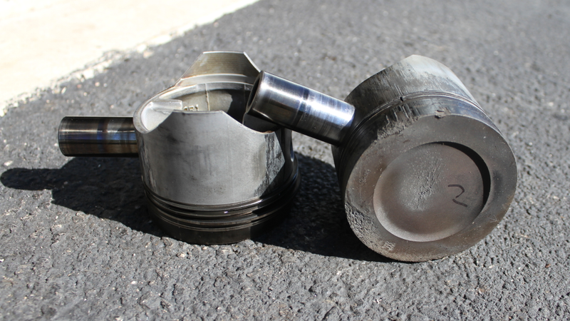 My two failing pistons. No. 1 on the left, No. 2 on the right.